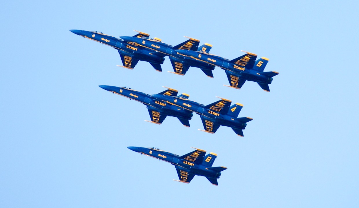 The Blue Angels flying in close formation, just 18 inches between each plane