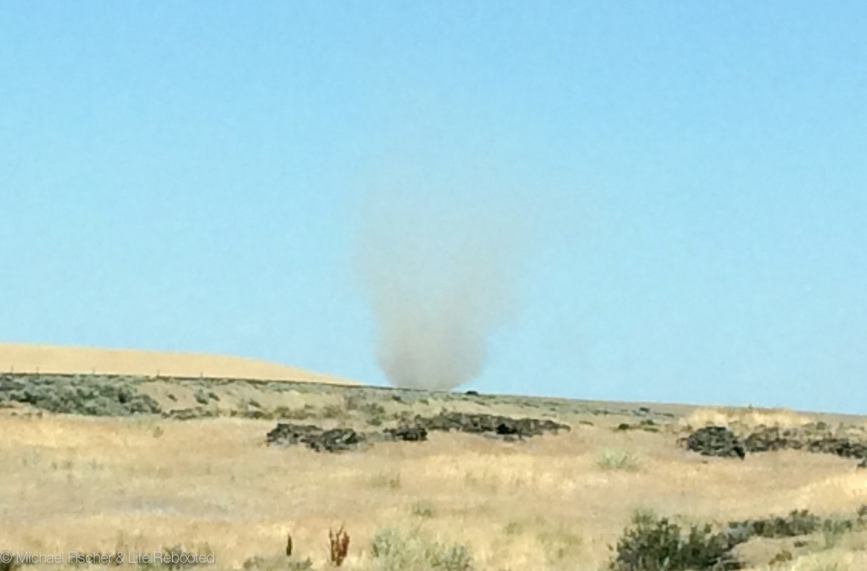 A dust devil not far off the highway near Spokane