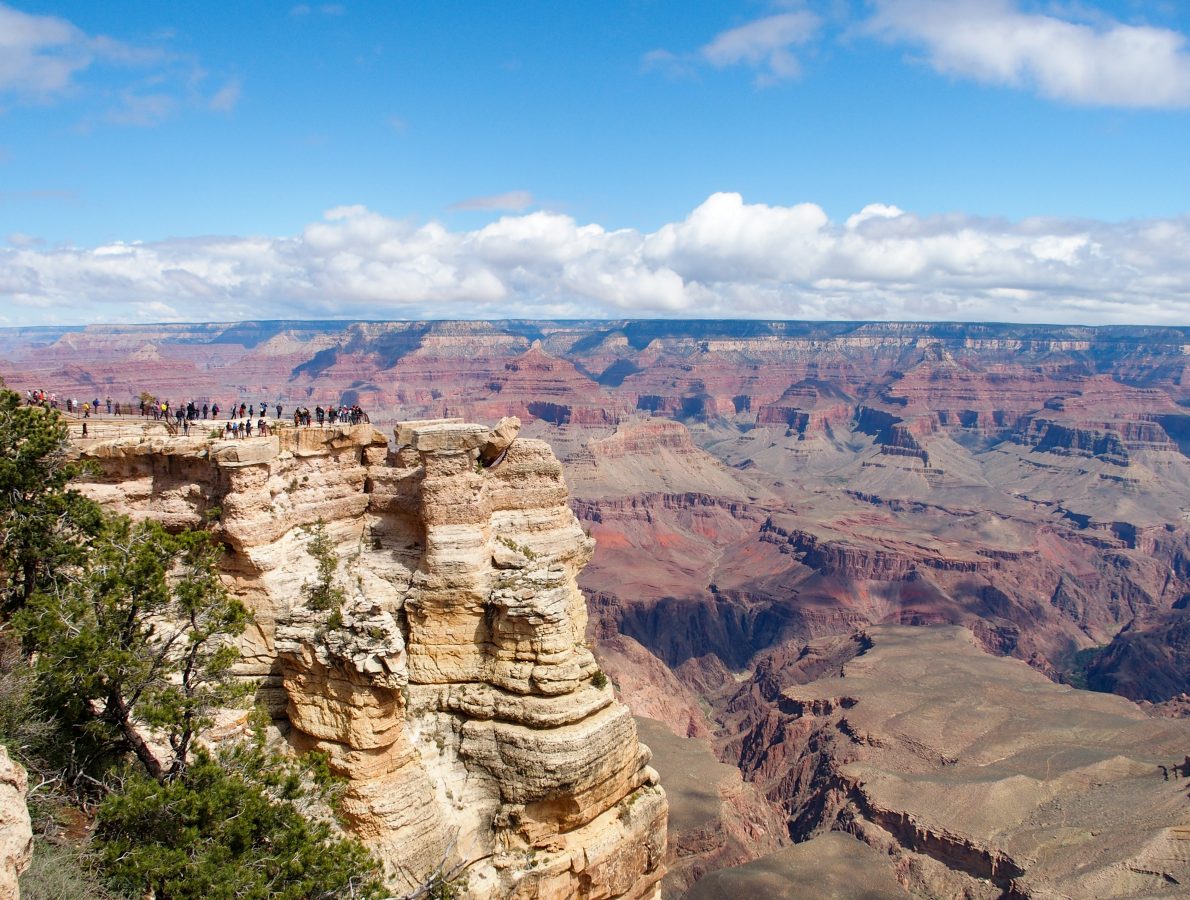 Tourists gathered at Mather Point (left) overlooking the Canyon.