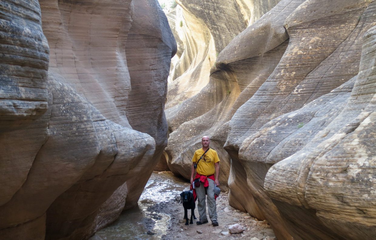 Hiking the Willis Creek Slot Canyon in Grand Staircase-Escalante National Monument.