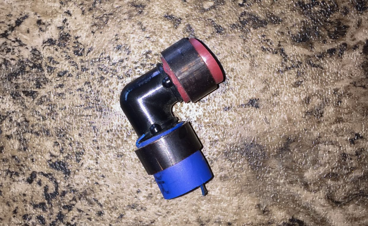 Bad elbow section removed with pipe cutter.